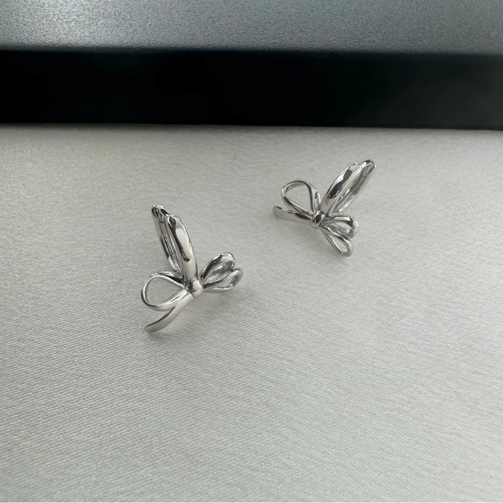Huggie Bow Silver Hoop Earrings for Women - Picture 2 of 5